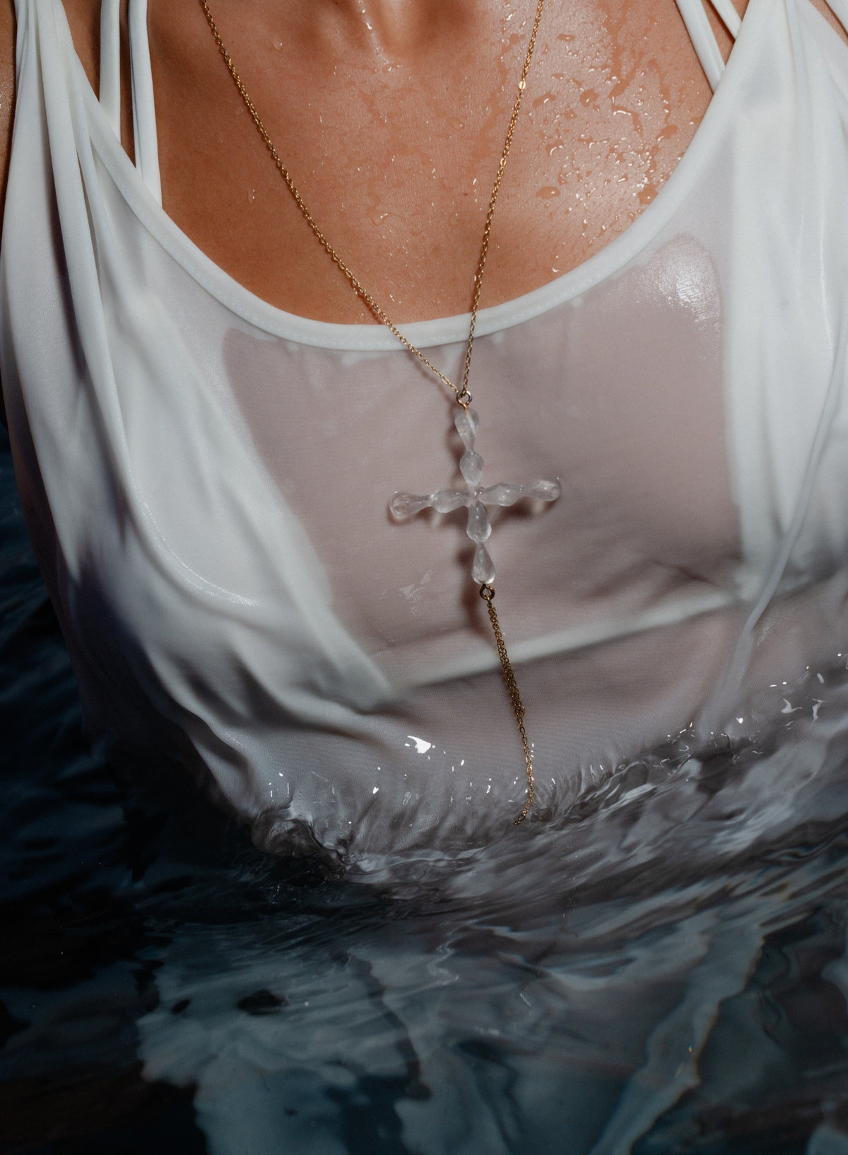 THE CROSS NECKLACE